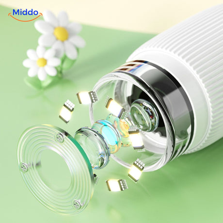 Portable kids microscope in outdoor use, exploring nature and insects outside.