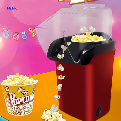 Mini electric popcorn maker filled with fresh popcorn kernels.