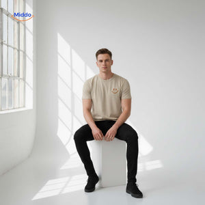 Beige cotton t-shirt with smiley print styled in minimalist men's fashion.