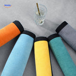 Modern chenille sofa cover in turquoise and yellow, ideal for contemporary home décor styling.