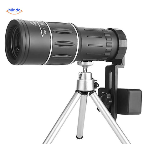 Night vision monocular mounted on tripod with smartphone compatibility.