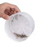 Compact electric mosquito trap shown in hand to demonstrate portable, chemical-free insect control.