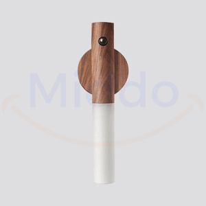 Motion-activated LED lamp illuminating dark room with white light for night visibility.