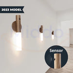 Portable LED lamp installed on wall for hands-free motion-sensor lighting.