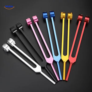 Multi-color tuning fork set showing various frequency options available.
