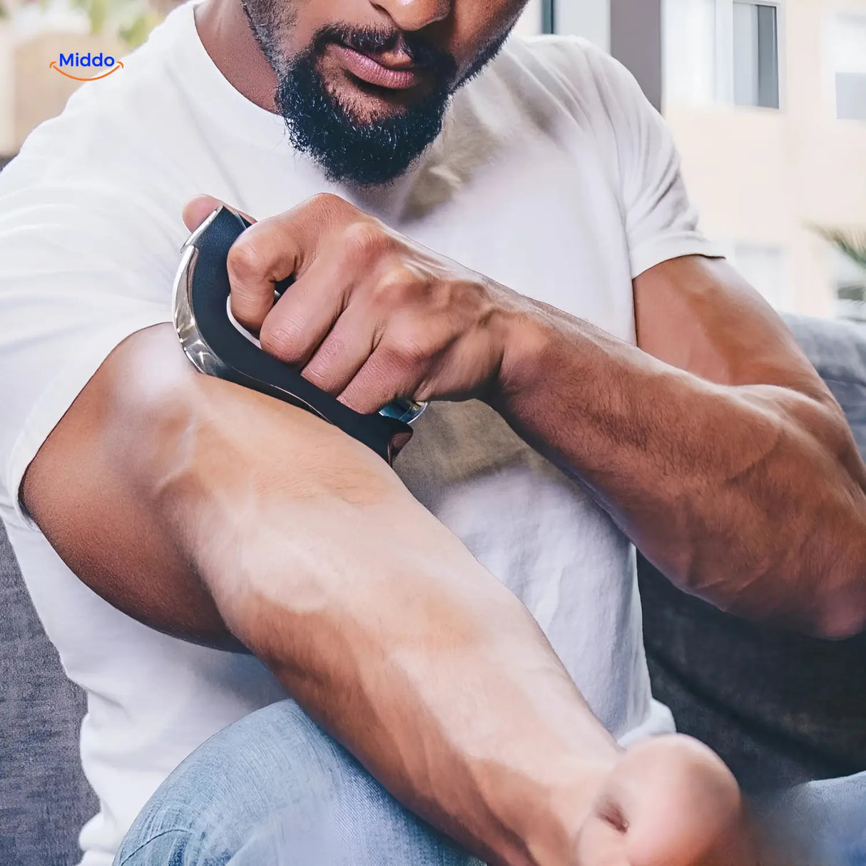 Person using Visiopro microcurrent massager for muscle recovery and relaxation.