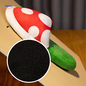 Close-up of soft cotton fabric and detailed anime character stitching on mushroom slippers.