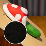 Close-up of soft cotton fabric and detailed anime character stitching on mushroom slippers.