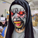 Nun mask with glowing red LED eyes and terrifying expression.