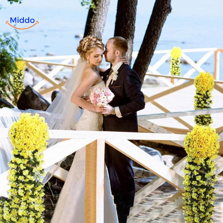 Artificial orchid cascade flowers as elegant wedding decoration.