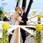 Artificial orchid cascade flowers as elegant wedding decoration.