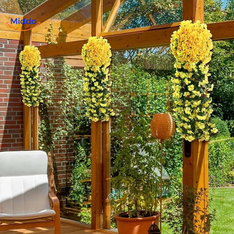 Artificial yellow orchid cascade with realistic tropical appearance.