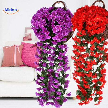 Artificial orchid flowers in rich purple and red tones.