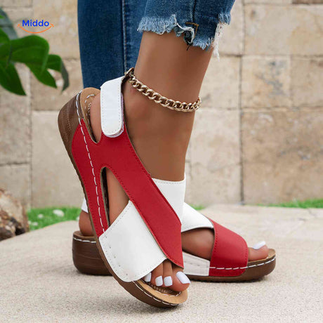 Casual orthopedic sandals with cross design offering style and foot support.