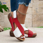 Casual orthopedic sandals with cross design offering style and foot support.