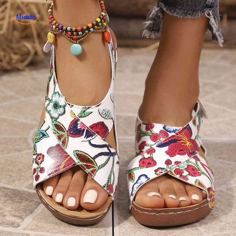 Floral print orthopedic sandals with comfort sole for supportive everyday wear.