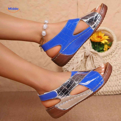 Glossy orthopedic women's sandals with cross strap for polished comfort support.