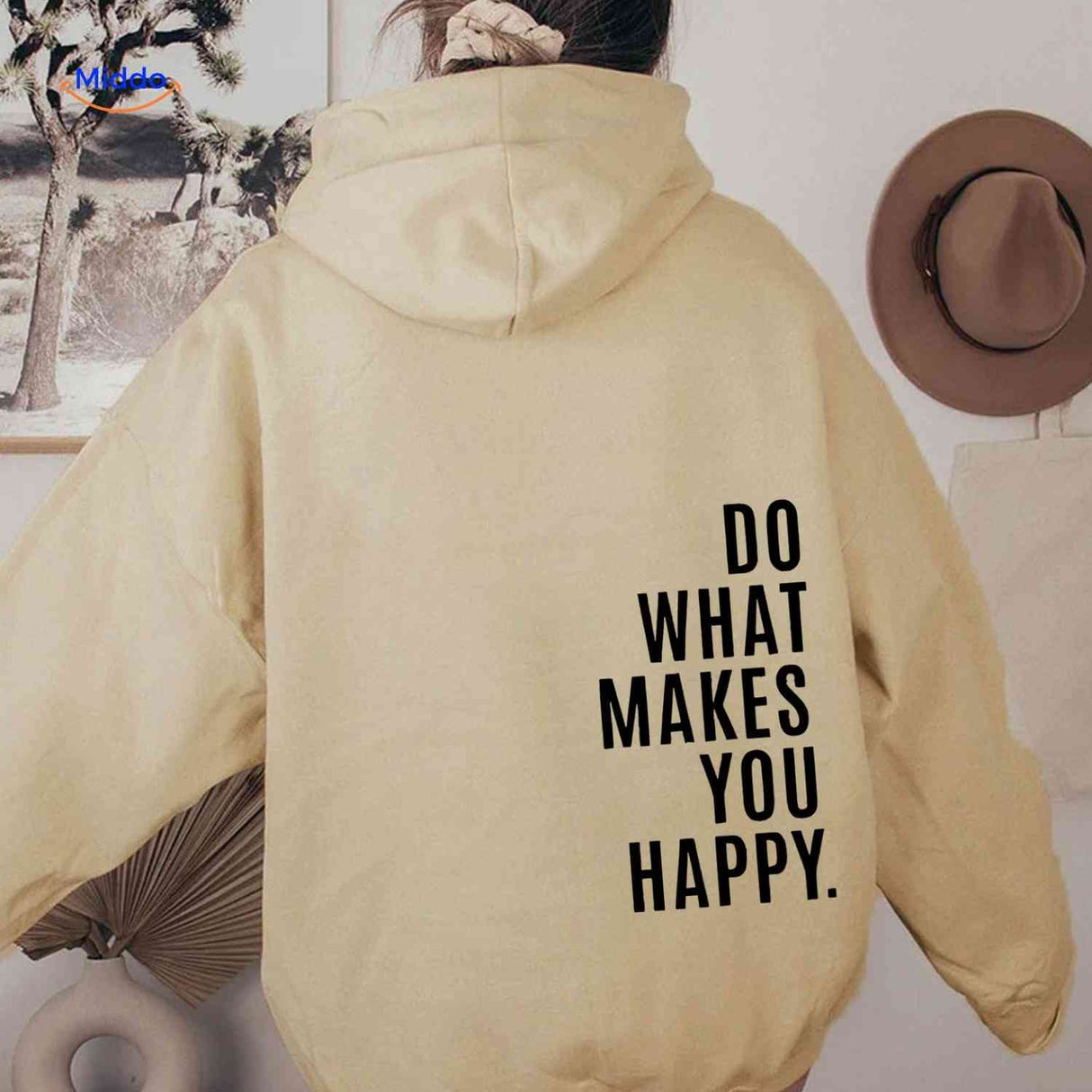 Beige oversized hoodie with black text design.