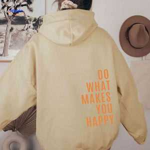Beige oversized hoodie with orange motivational text.