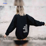 Black oversized hoodie with white motivational text.