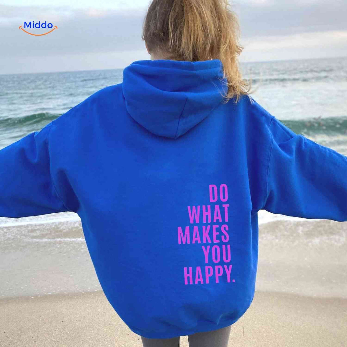 Blue oversized hoodie with pink graphic detail.