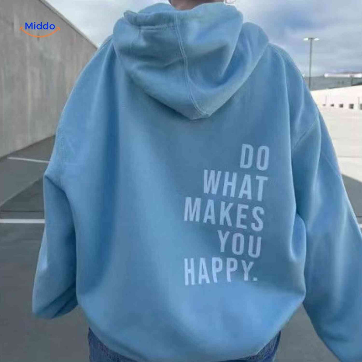 Light blue oversized hoodie featuring white text.