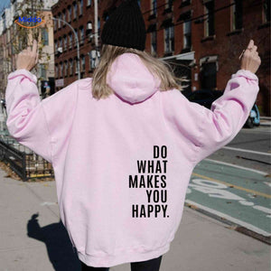 Pink oversized hoodie with black graphic detail.