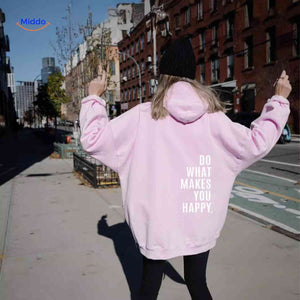 Pink oversized hoodie with white text design.