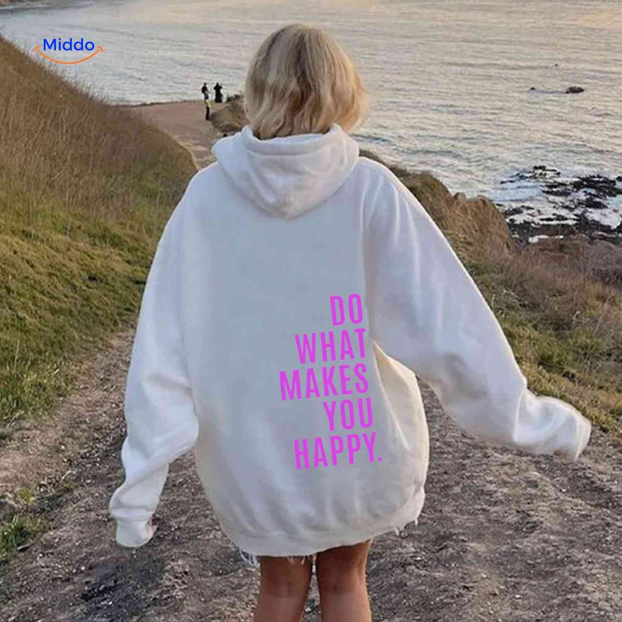 White oversized hoodie with pink graphic message.