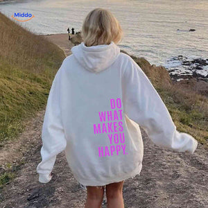 White oversized hoodie with pink graphic message.