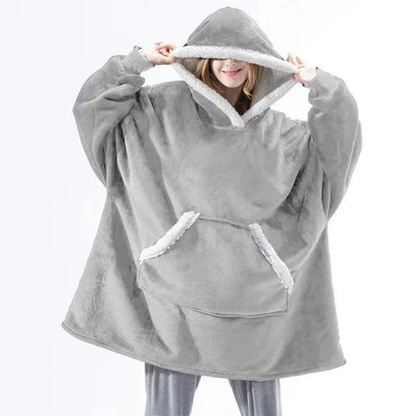 Oversized sherpa fleece hoodie styled for ultimate comfort and relaxation at home.