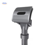 Pet hair brush with vacuum nozzle attachment for dog grooming.