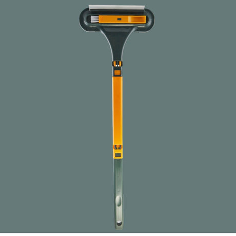 MultiBrush pet hair remover with soft rubber strip in orange color for effective cleaning.