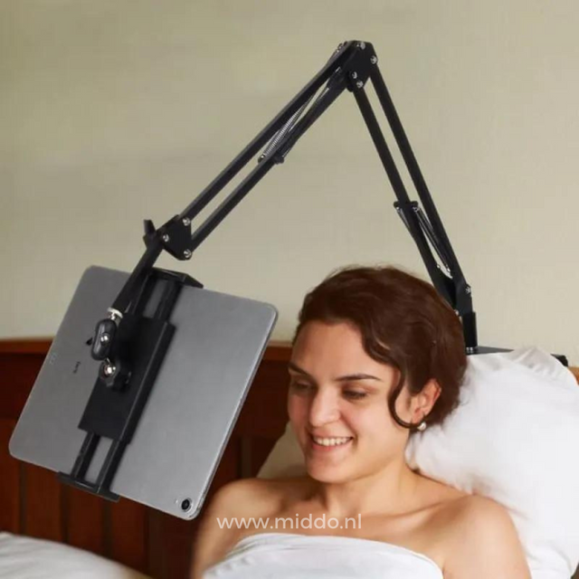 FlexArm tablet holder in comfortable bed viewing position with flexible arm.