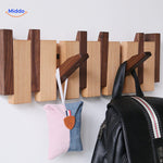 Piano coat rack hanging system displaying bags with foldable hooks fully extended.