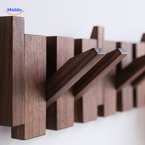 Modern piano coat rack design in handmade wood with minimalist architectural appeal.