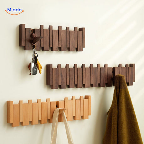 Wooden piano coat rack with multifunctional foldable hooks for versatile storage.