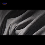 Black leg elevation pillow showing dense fabric weave and durable material quality.
