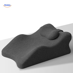Black leg elevation pillow with integrated head and neck support for full comfort.