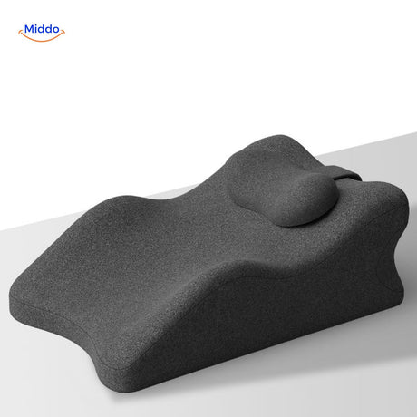 Black leg elevation pillow with integrated head and neck support for full comfort.