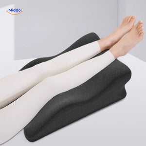 Leg elevation pillow providing full body relaxation and therapeutic comfort support.