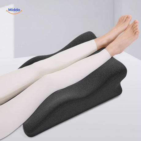 Leg elevation pillow providing full body relaxation and therapeutic comfort support.