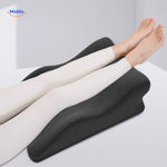 Leg elevation pillow providing full body relaxation and therapeutic comfort support.