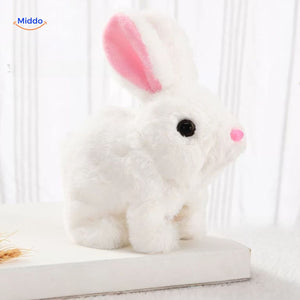 Pink plush bunny toy with white inner ears close-up, highlighting the realistic and detailed design.
