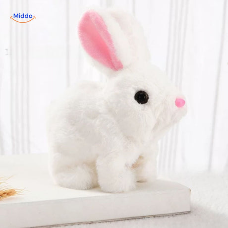 Pink plush bunny toy with white inner ears close-up, highlighting the realistic and detailed design.