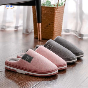 Pink and gray non-slip cotton slippers in matching pair set.