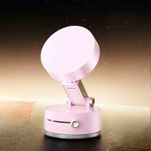 Pink magnetic phone stand for stylish desk or table display.