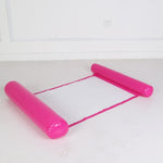 Pink inflatable water hammock floating peacefully in pool.