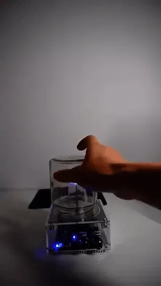 PlasmaTune Tesla coil plasma arc demonstration under a glass jar