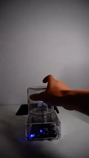 PlasmaTune Tesla coil plasma arc demonstration under a glass jar